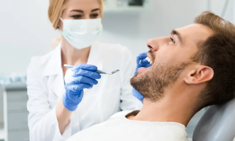 dentist examining patient during first dental appointment in salt lake city ut